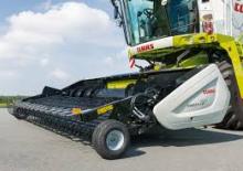Combine harvesters pick up Claas Swath UP 450