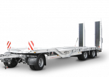 Lowbed Trailers Schwarzmüller 3-axle low loader trailer with wheel recesses for transporting construction machinery