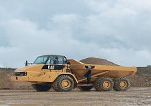 Mafsallı damperli kamyonlar Caterpillar 725