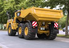 Mafsallı damperli kamyonlar Caterpillar 730