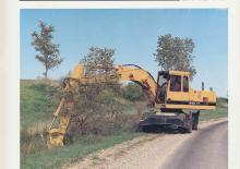 Tekerlekli ekskavatörler Caterpillar 214B FT