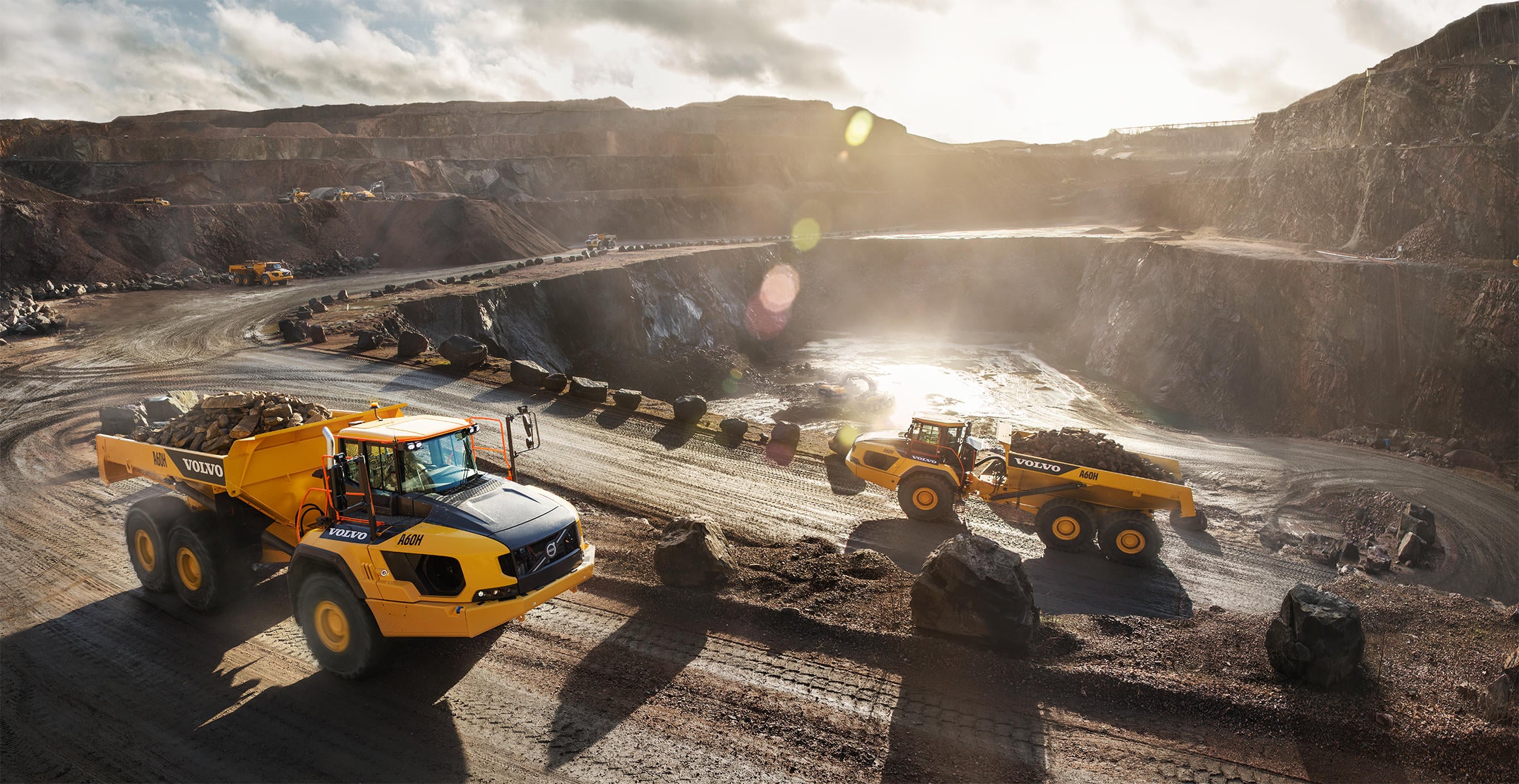 Volvo A60H articulated dump truck in large-scale open-pit mining operation