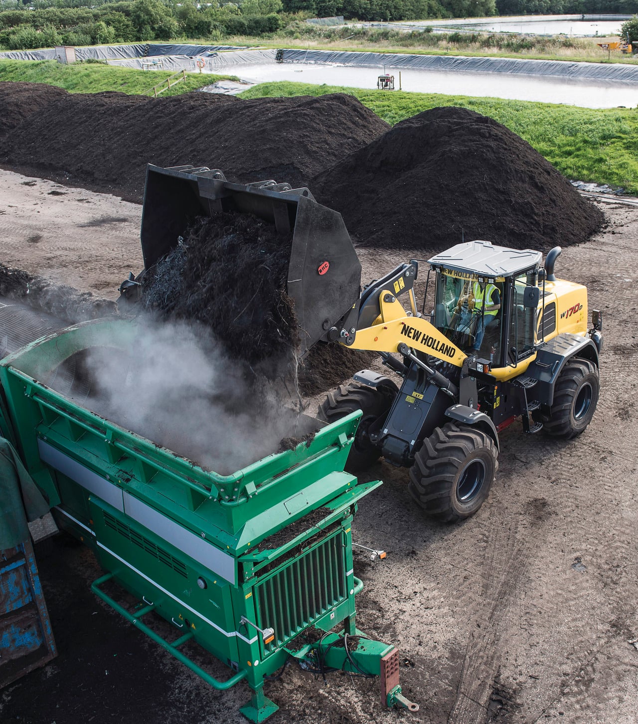 New Holland. Previous. E57C · W170D LR